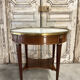 Small salon table in Directoire style, 20th century.