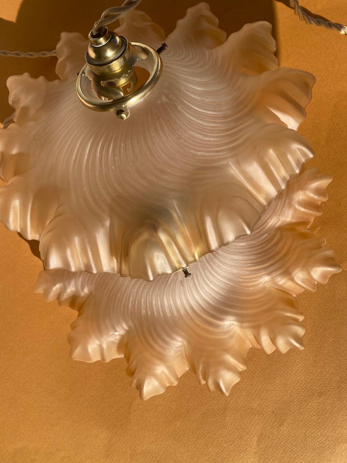 Pair of amber pendant lights