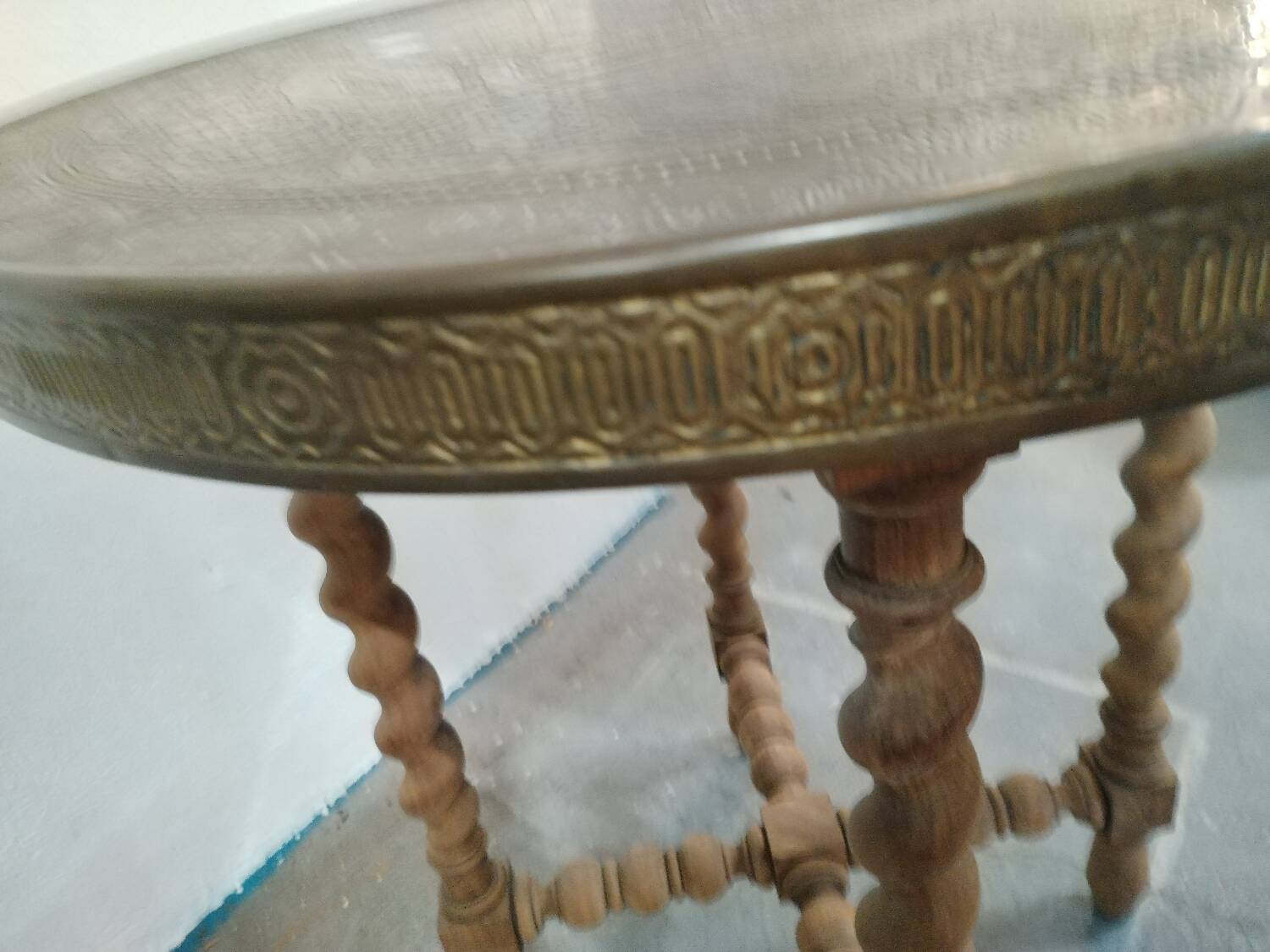 Brass side table with turned legs
