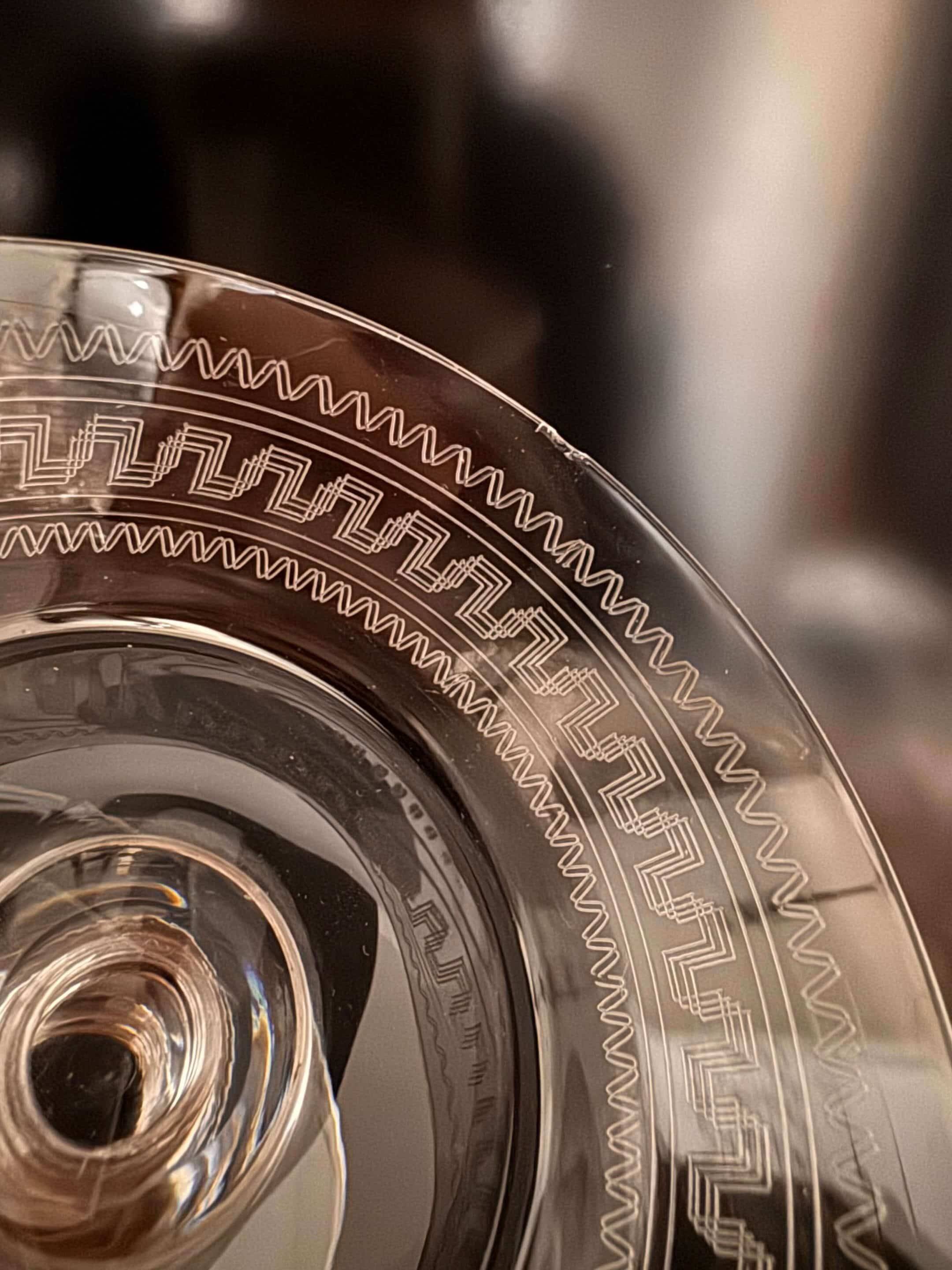 Baccarat, set of 10 engraved crystal champagne glasses from 1900.