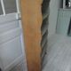 Small vintage bookcase, 5 fixed shelves, interior sublimated in verdigris, waxed finish.