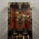 20th century China: Pretty bookcase in lacquer, hard stone and mother-of-pearl with three glazed sides