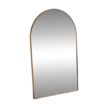Contemporary Scandinavian mirror in gold metal with rounded corners.