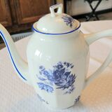 Blue and white ceramic coffee service with flowers.