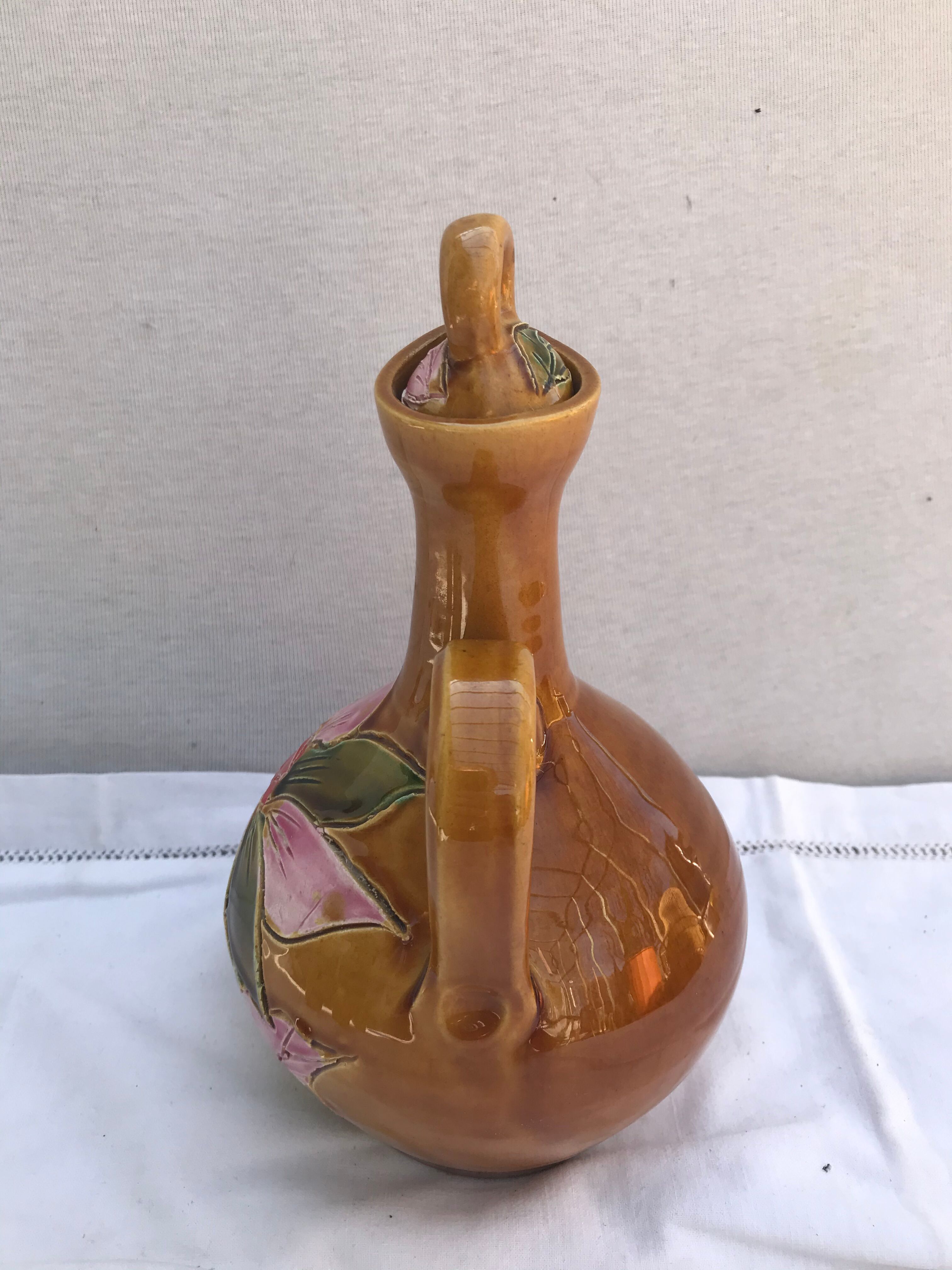 Old carafe with 8 ceramic glasses