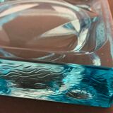 Ashtray paved in blue glass
