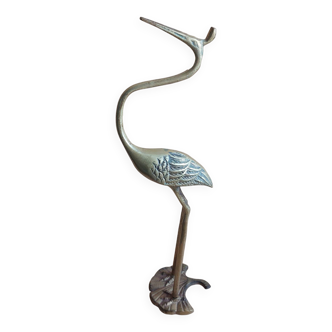 Heron bird in vintage golden brass