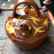 Orange glazed terracotta gargoulette