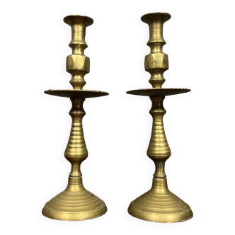 ORIENT XIX: Pair of large cup candlesticks in chiseled and gilded brass