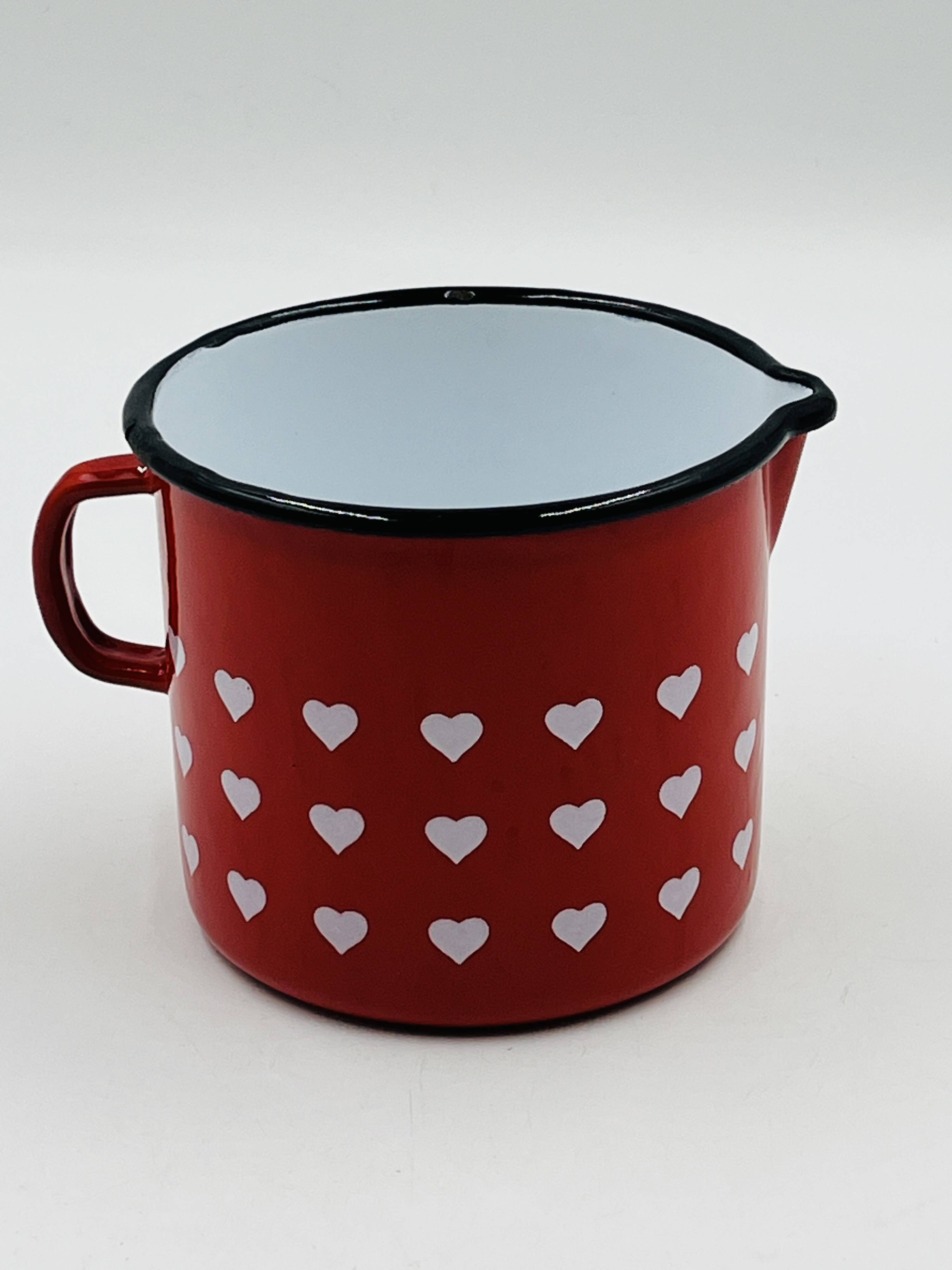 Vintage red enamelled measuring jug with hearts