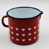 Vintage red enamelled measuring jug with hearts