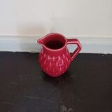 Small pitcher in old red earthenware