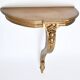 Console d'applique murale en bois sculpté à patine doré