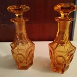 Pair of bottles amber-colored
