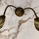 Articulated shell wall light