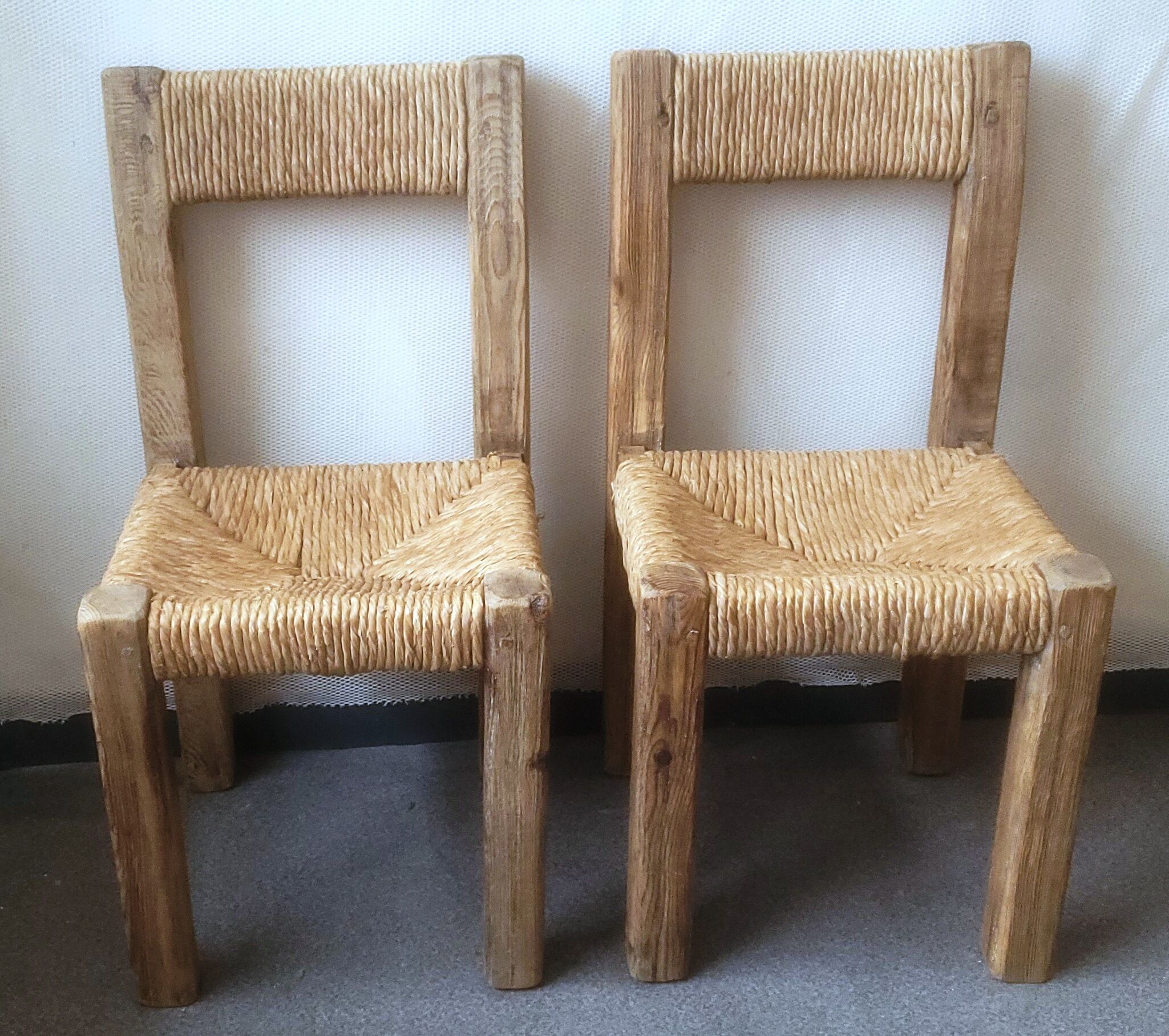 Pair of brutalist chairs in wood and straw