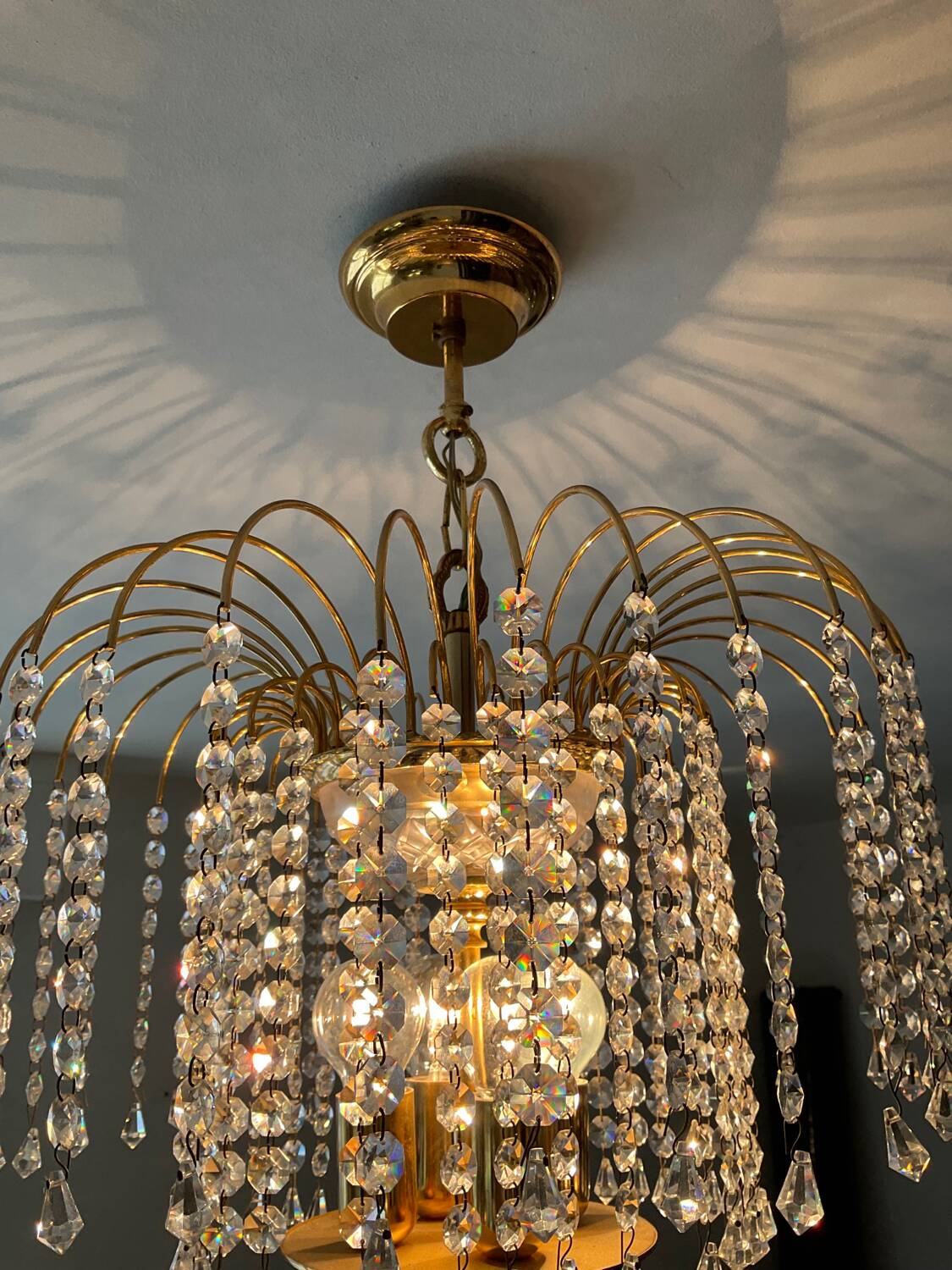 Brass waterfall chandelier with crystal tassels