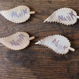 A set of 4 handcrafted pottery knife rests in blue.