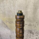Vintage brutalist floor lamp made of turned wood.
