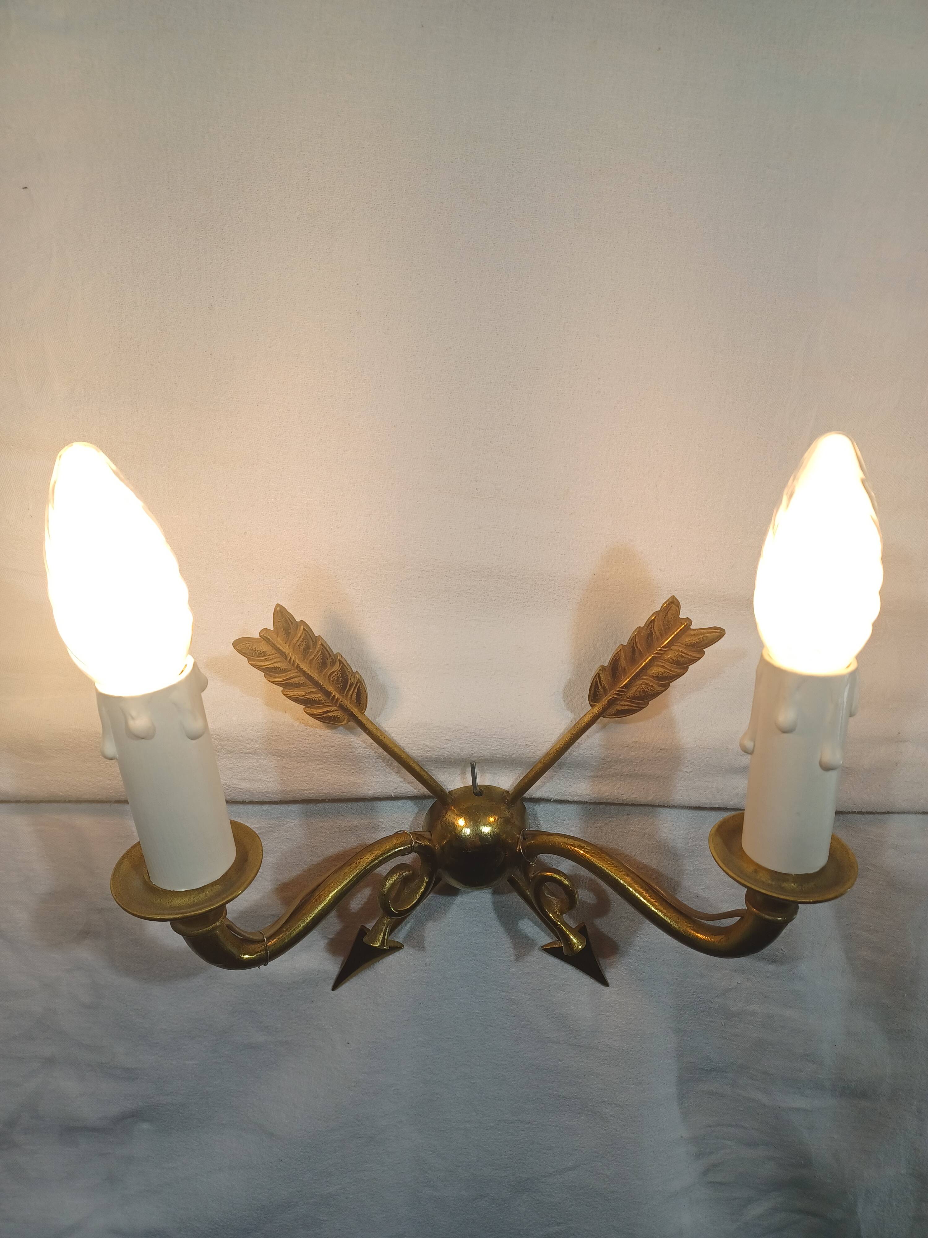 Empire style arrow wall light