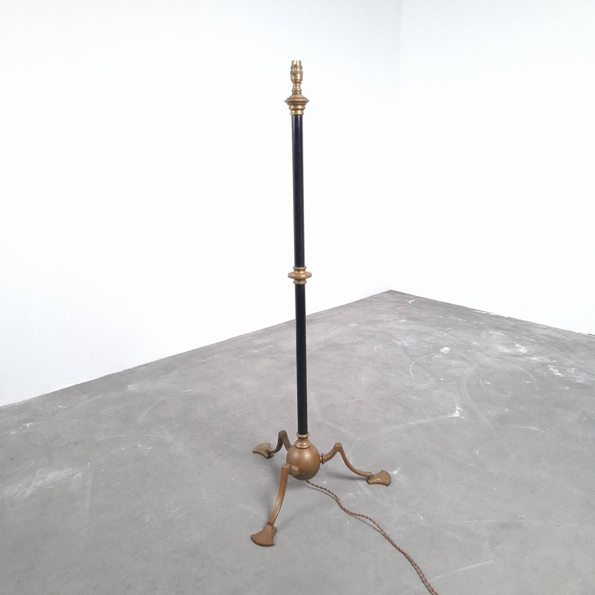 Art and Craft tripod floor lamp in bronze.