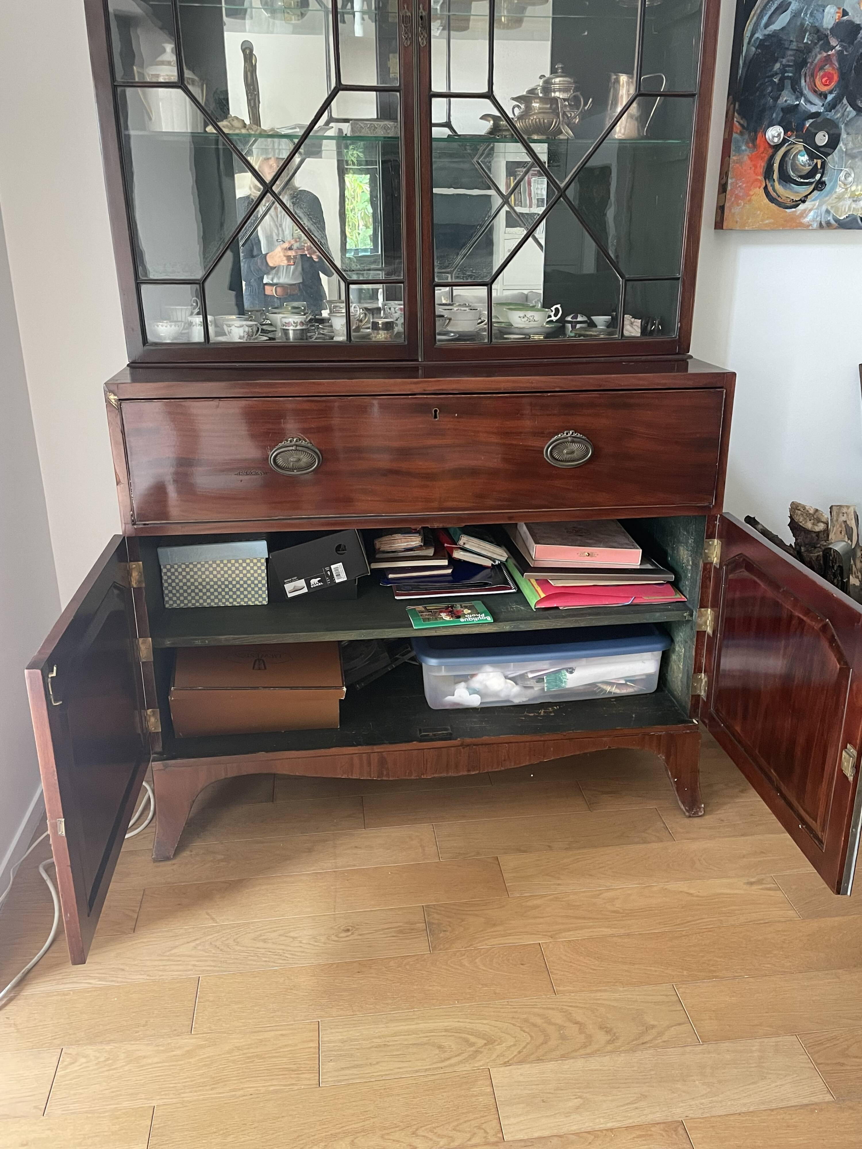Library with English mahogany secretary.