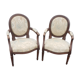 Paire de fauteuils medaillon