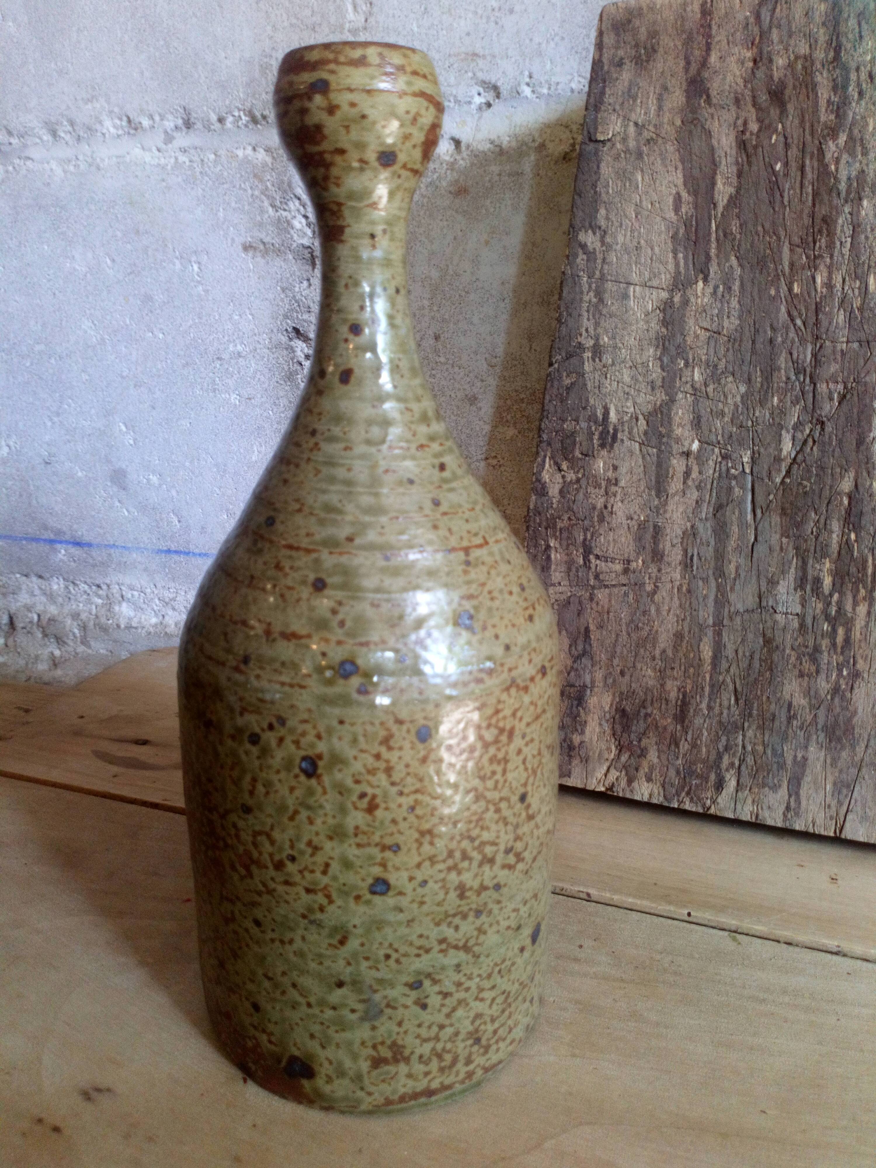Bottled sandstone vase with a narrow neck