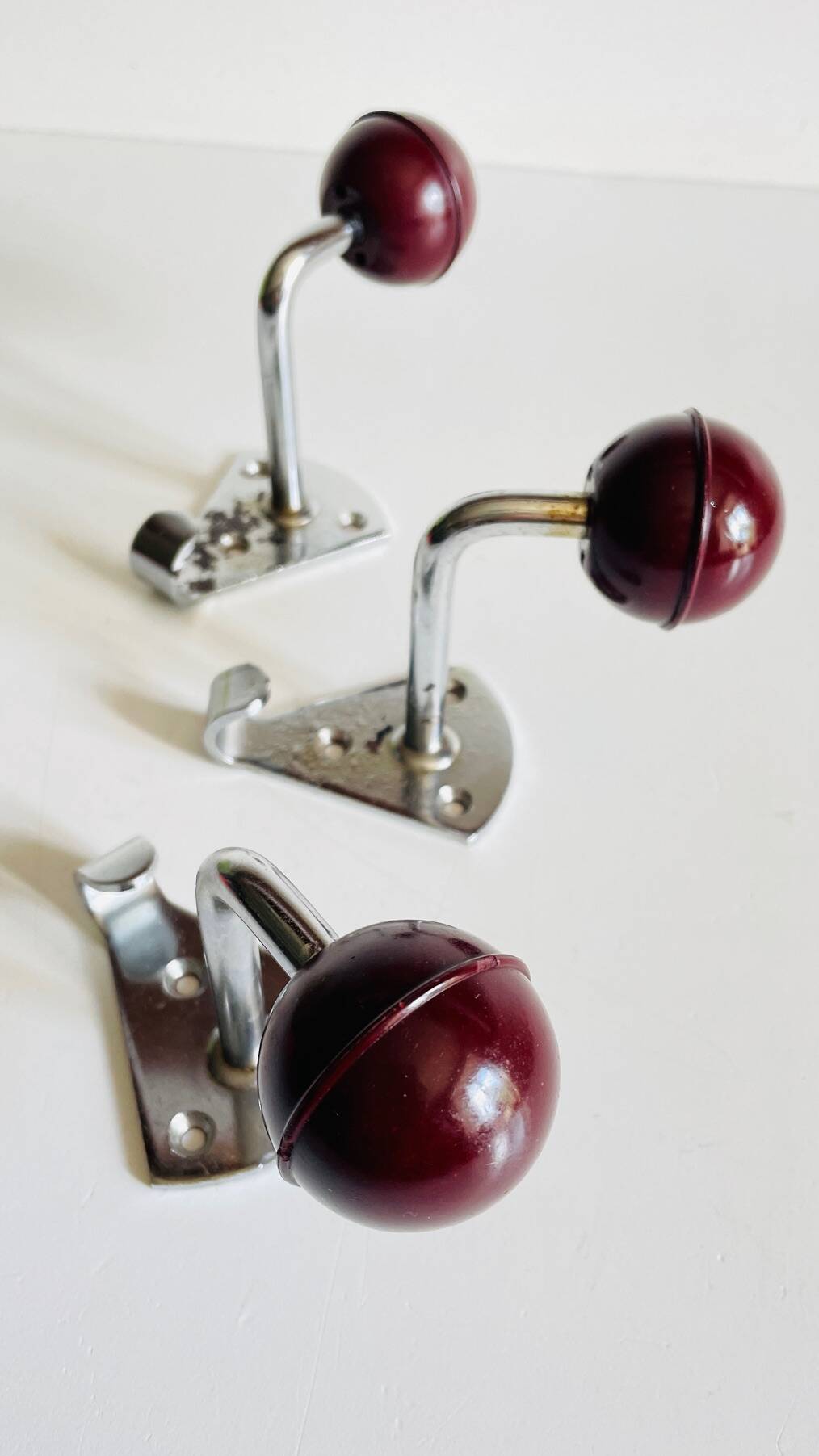 Chrome and bakelite coat hooks from the 70s