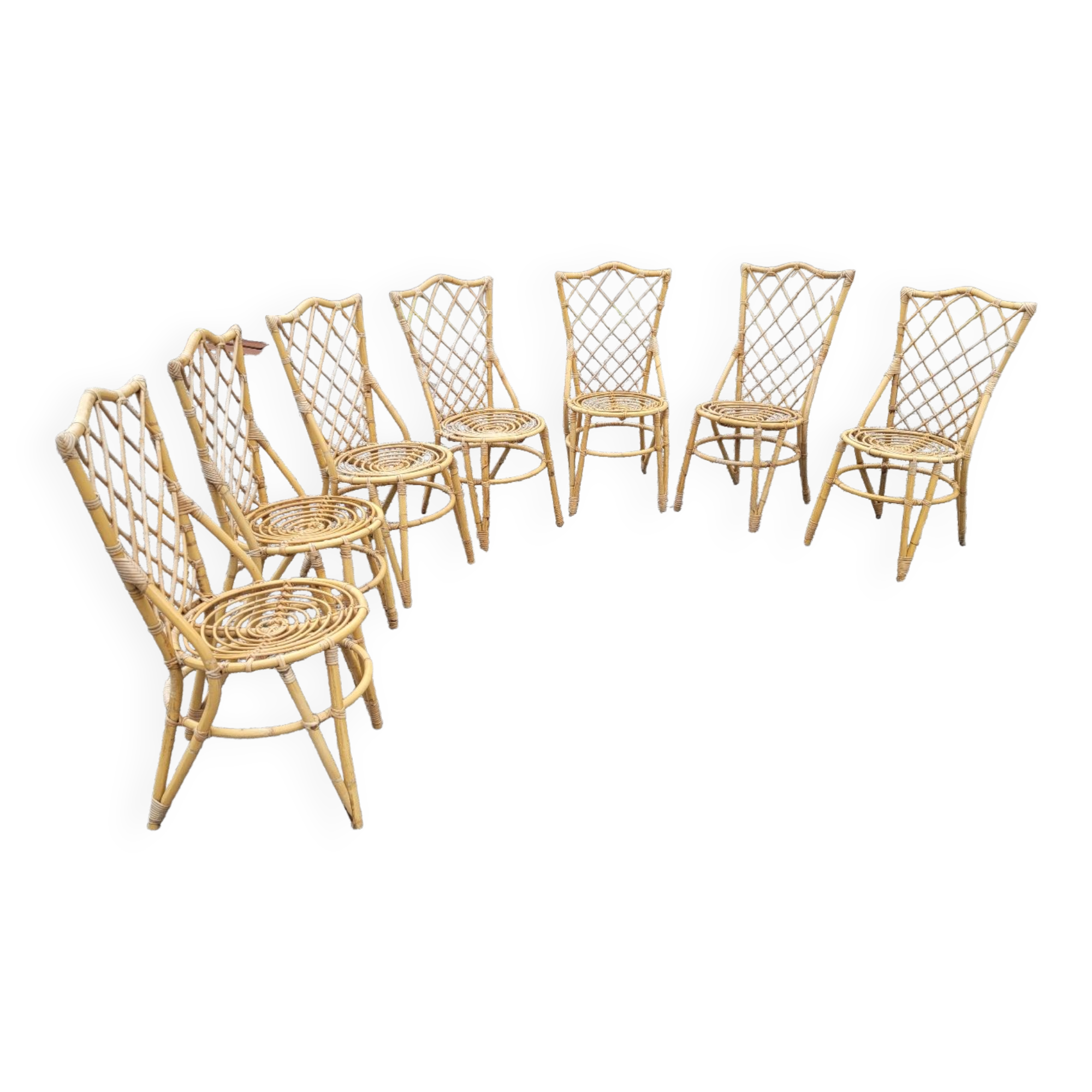 7 vintage rattan chairs