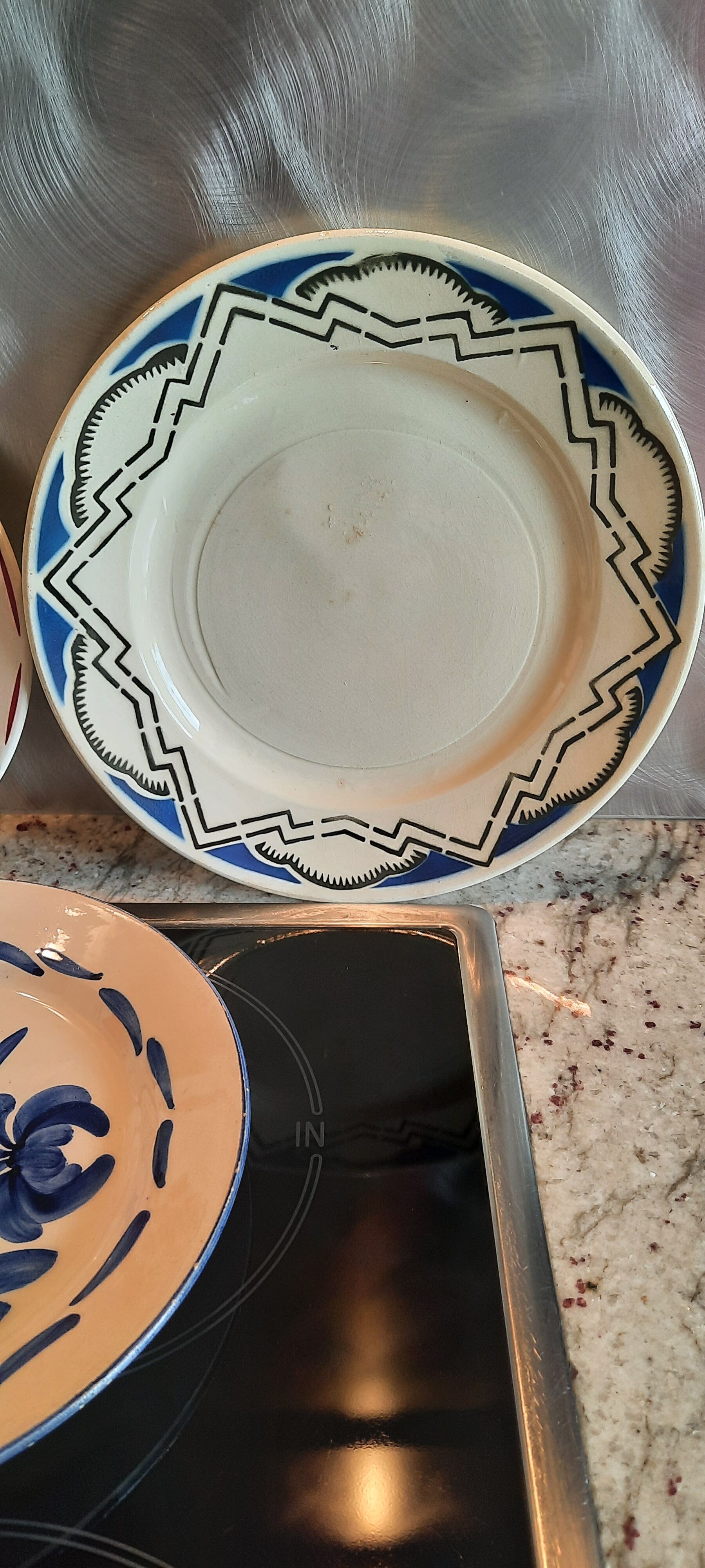 Old flat faience plates