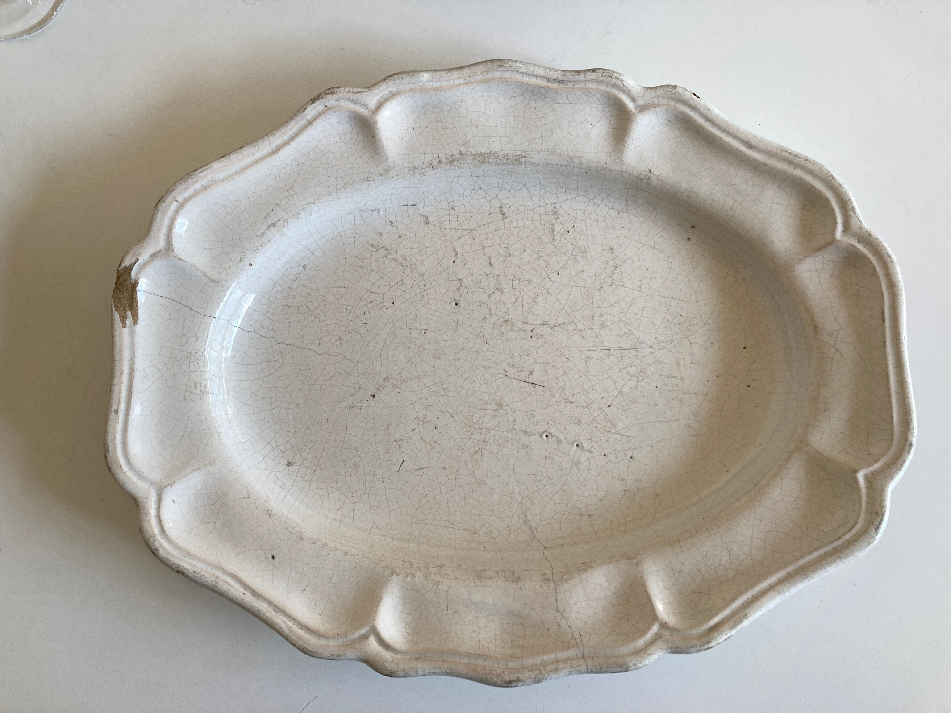 19th-day polished earth dish with godrons