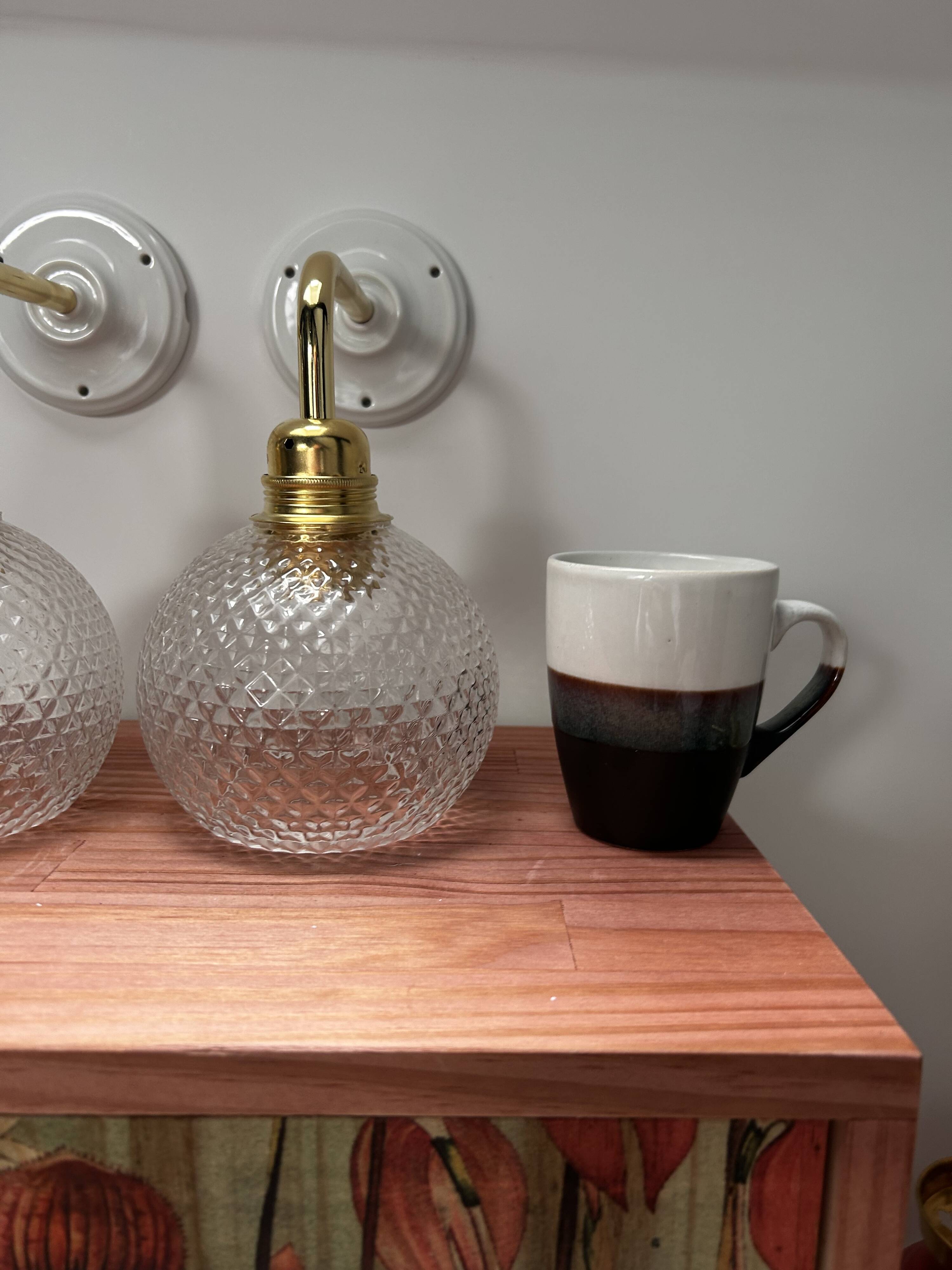 Pair of chiseled glass wall sconces