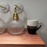 Pair of chiseled glass wall sconces
