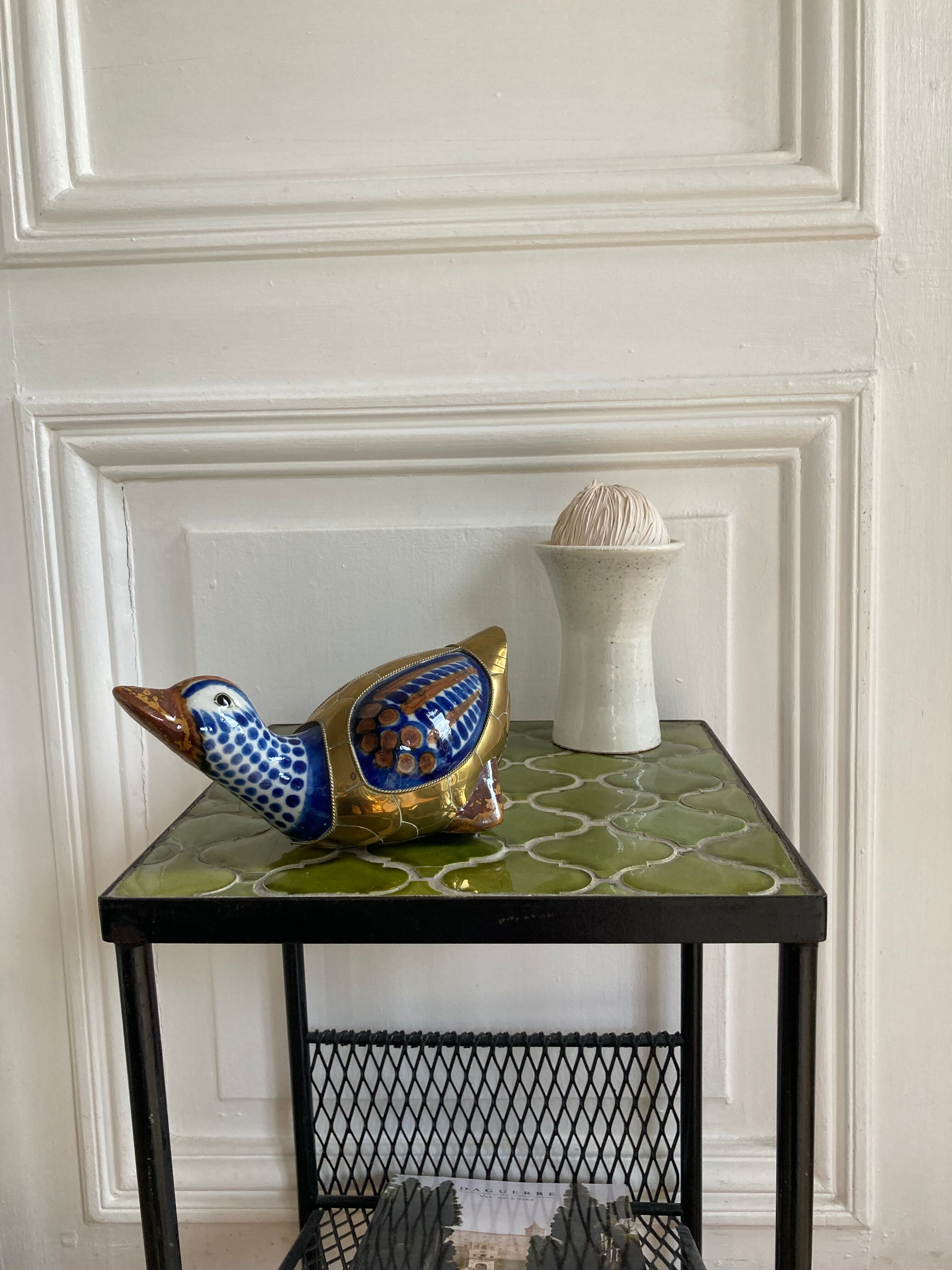 Brass duck and ceramic