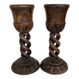 Pair of large twisted wooden candlesticks