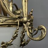 Lustre de style Louis XV. Bronze massif, cristal.