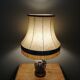 Ceramic lamp with Asian decoration with matching lampshade.
