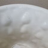 Important white earthenware pot cache with leafy decoration