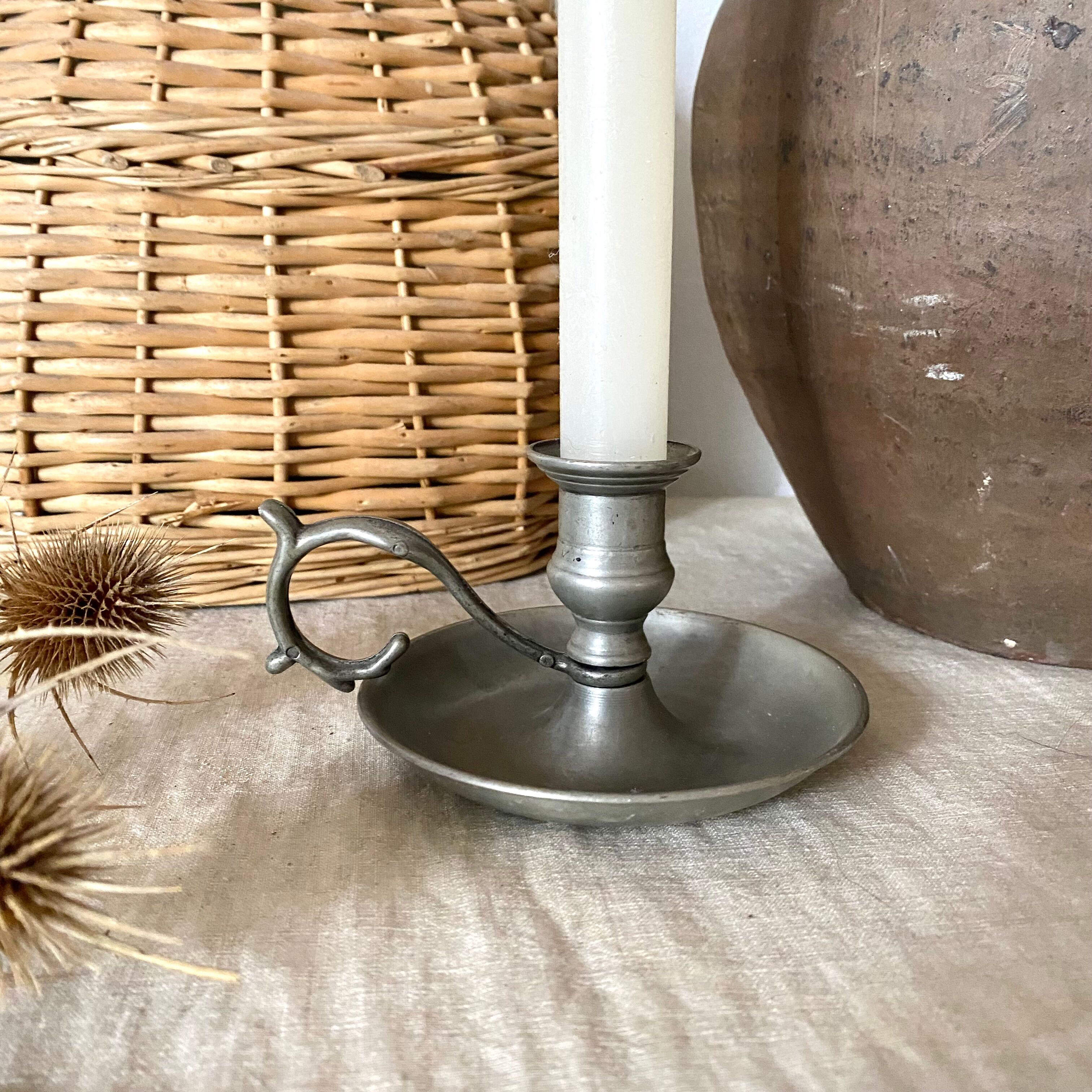 Tin thumb candle holder