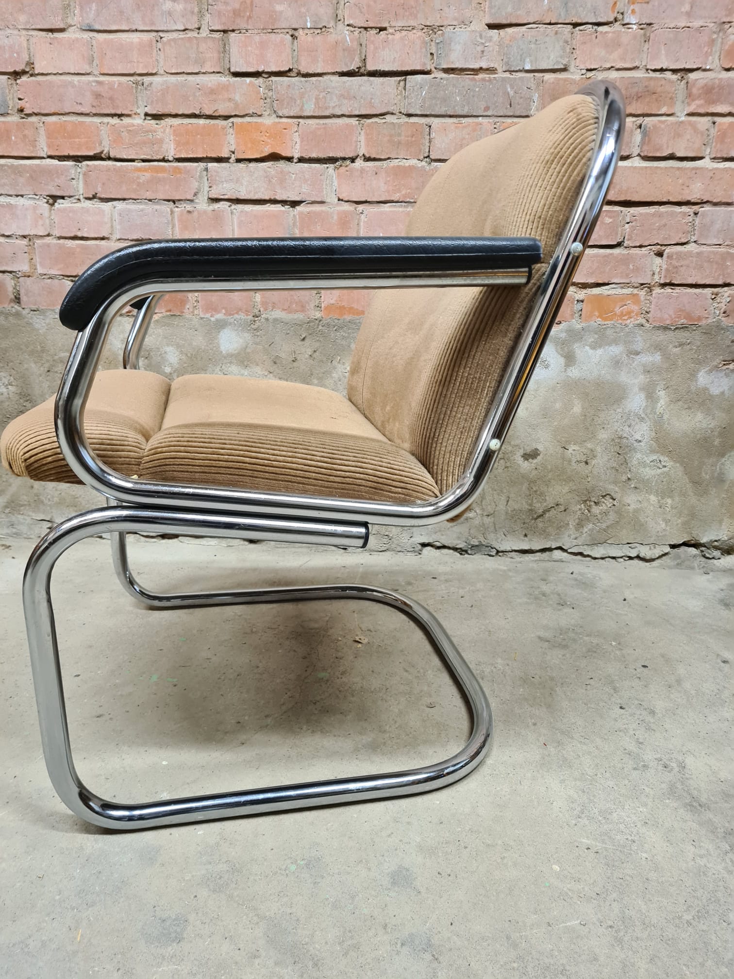 Vintage tubular ribbed office armchair
