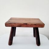 Old small solid wood milking stool