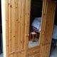 Wardrobe three doors, one with mirror, three drawers in solid pine wood