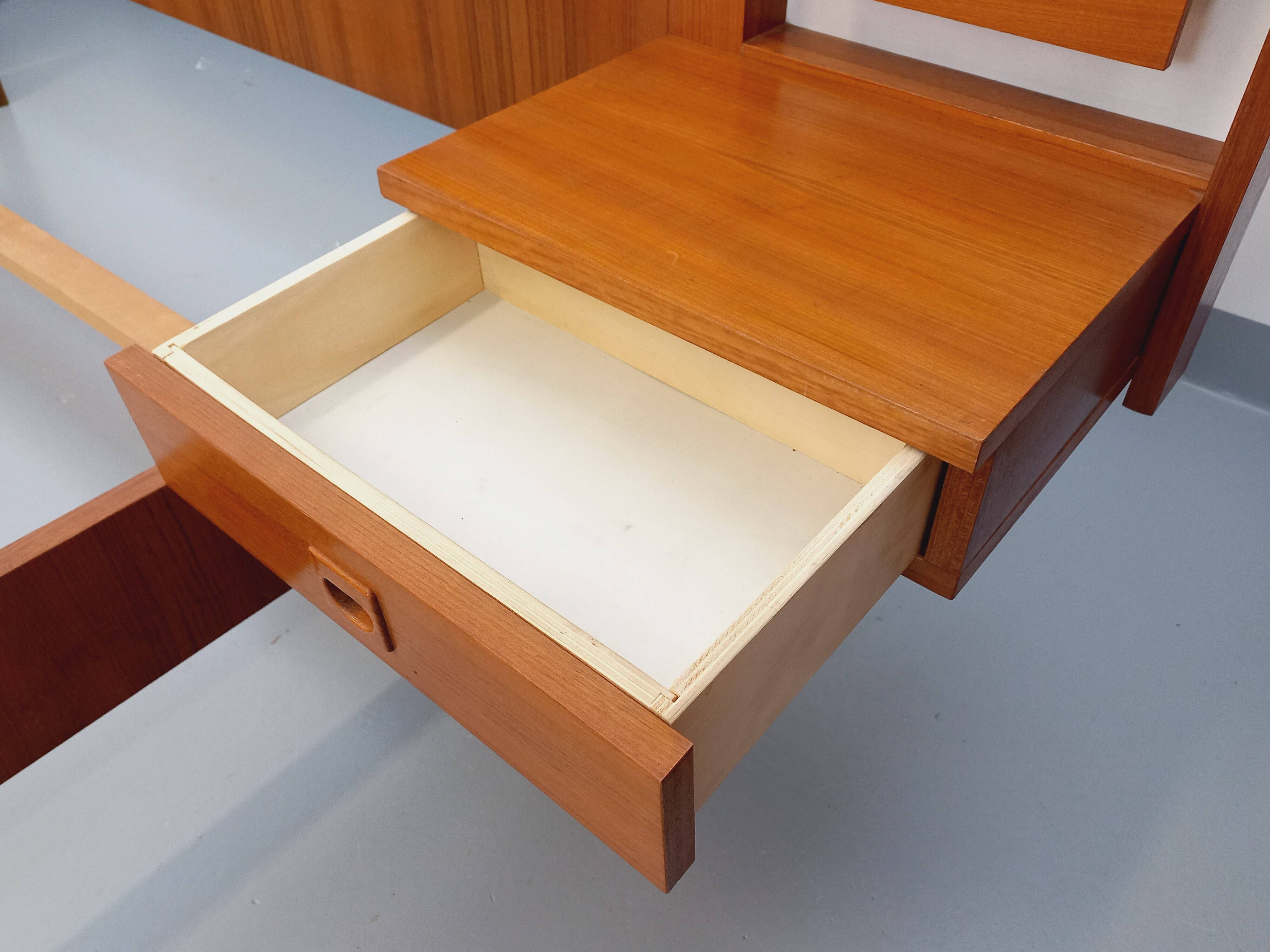 Vintage Scandinavian style double bed in teak from the 60s with integrated bedside lights