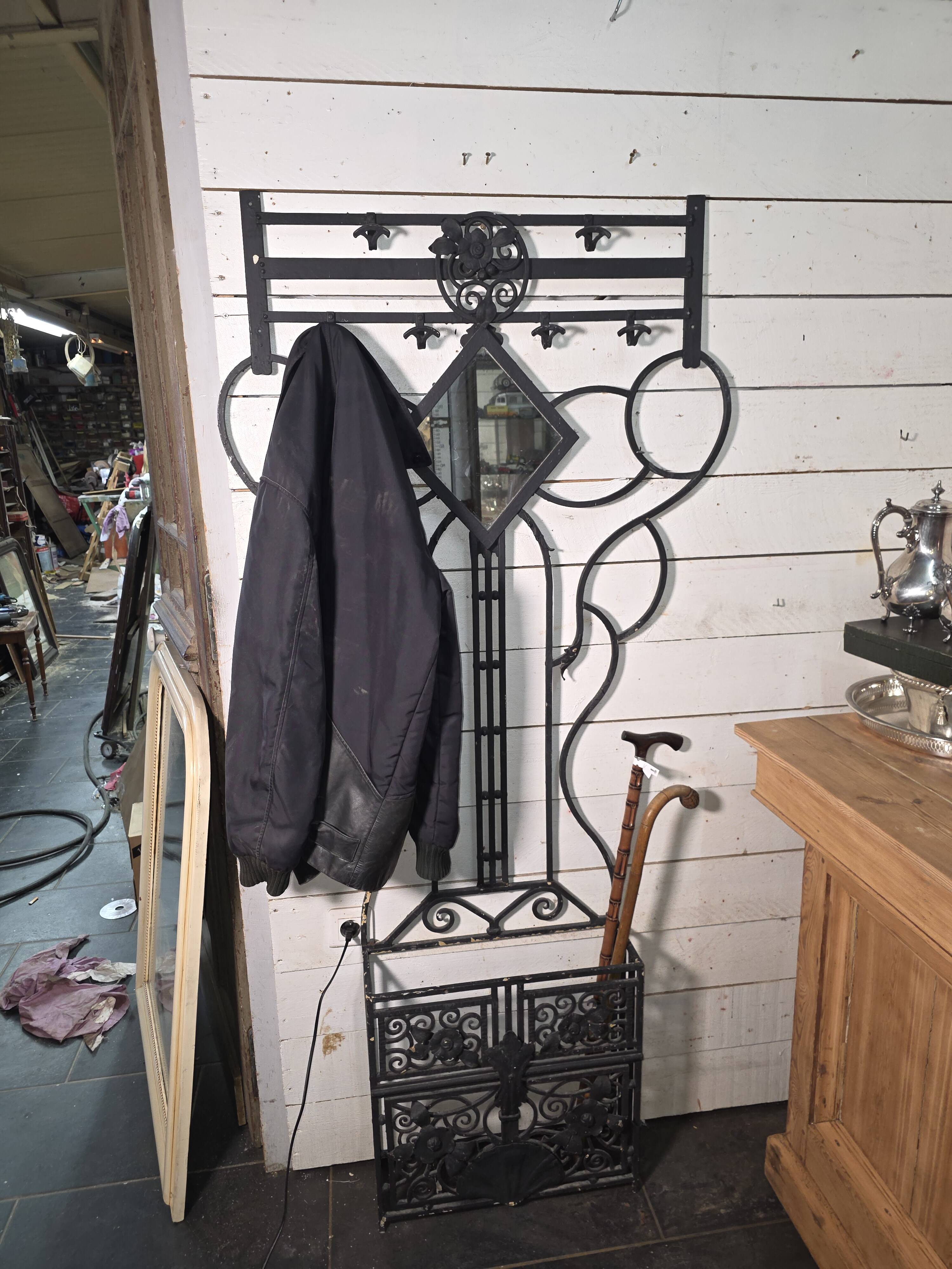 Art Deco coat rack wardrobe in wrought iron from the 1930s.