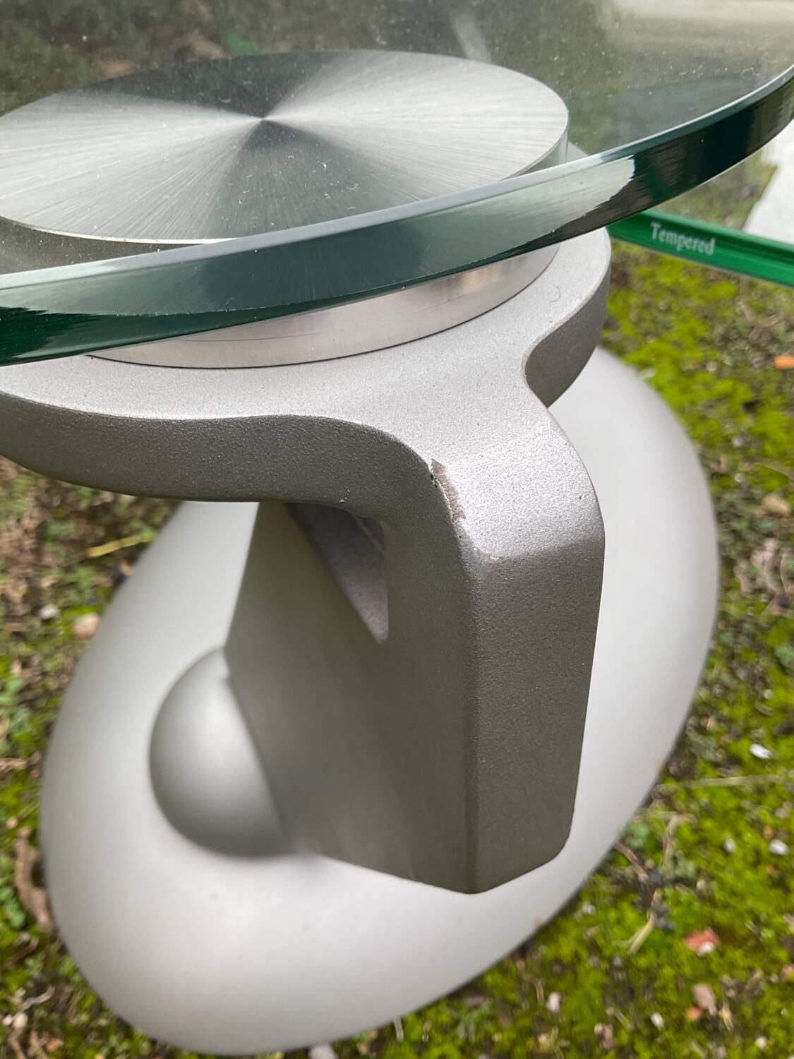 Naos designer coffee table in tempered glass and cast iron