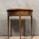 Louis XVI style half-moon console in mahogany and light wood marquetry circa 1850