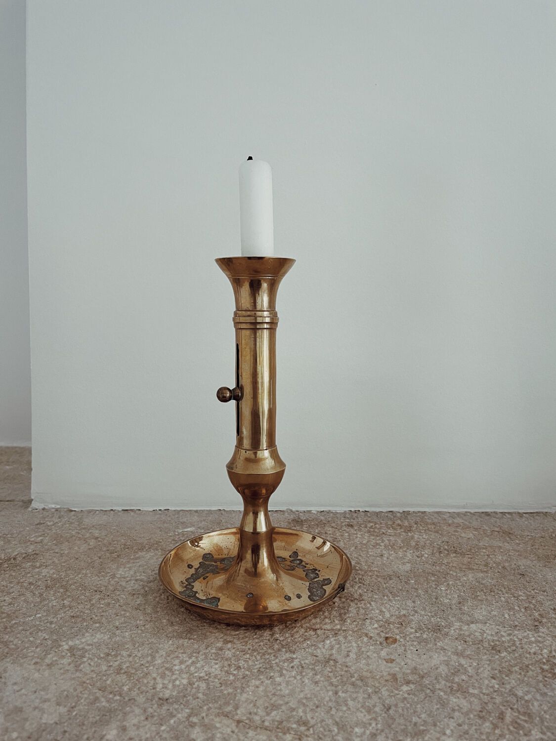 Antique brass candle holder