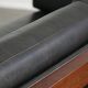 Timeless 3-seater Art Deco design sofa  upholstered in black cowhide leather