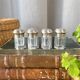 Suite de 4 salières individuelles argent & cristal